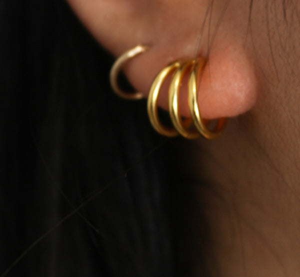 triple hoop gold earrings